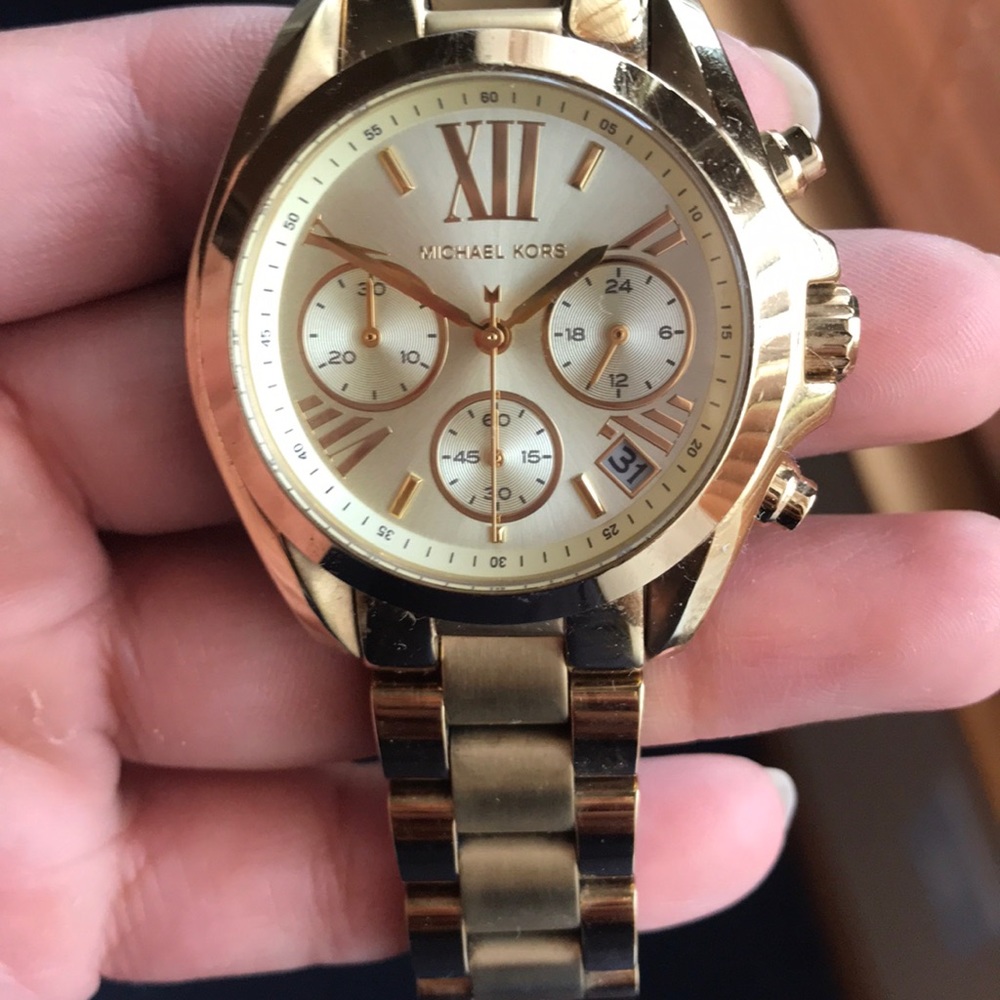 Gold MK watch